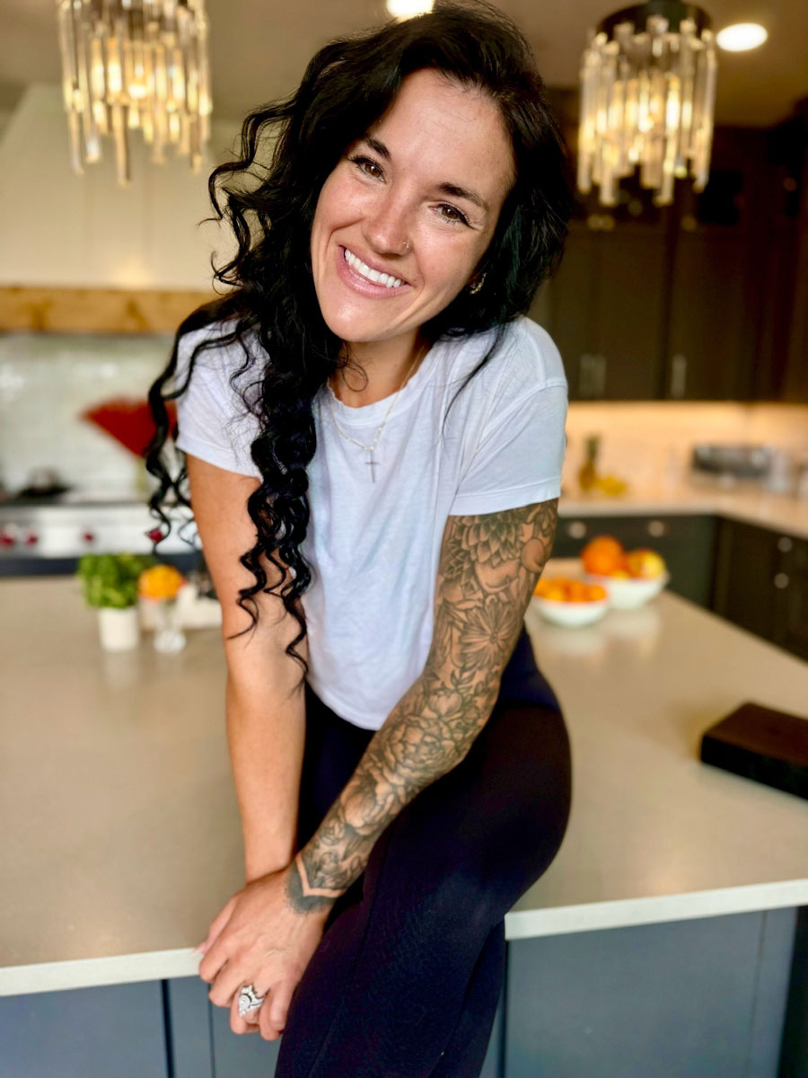 Britt Mudd in the kitchen smiling