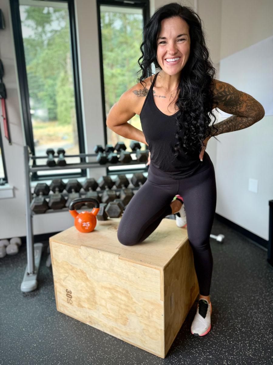 Britt Mudd at the gym smiling